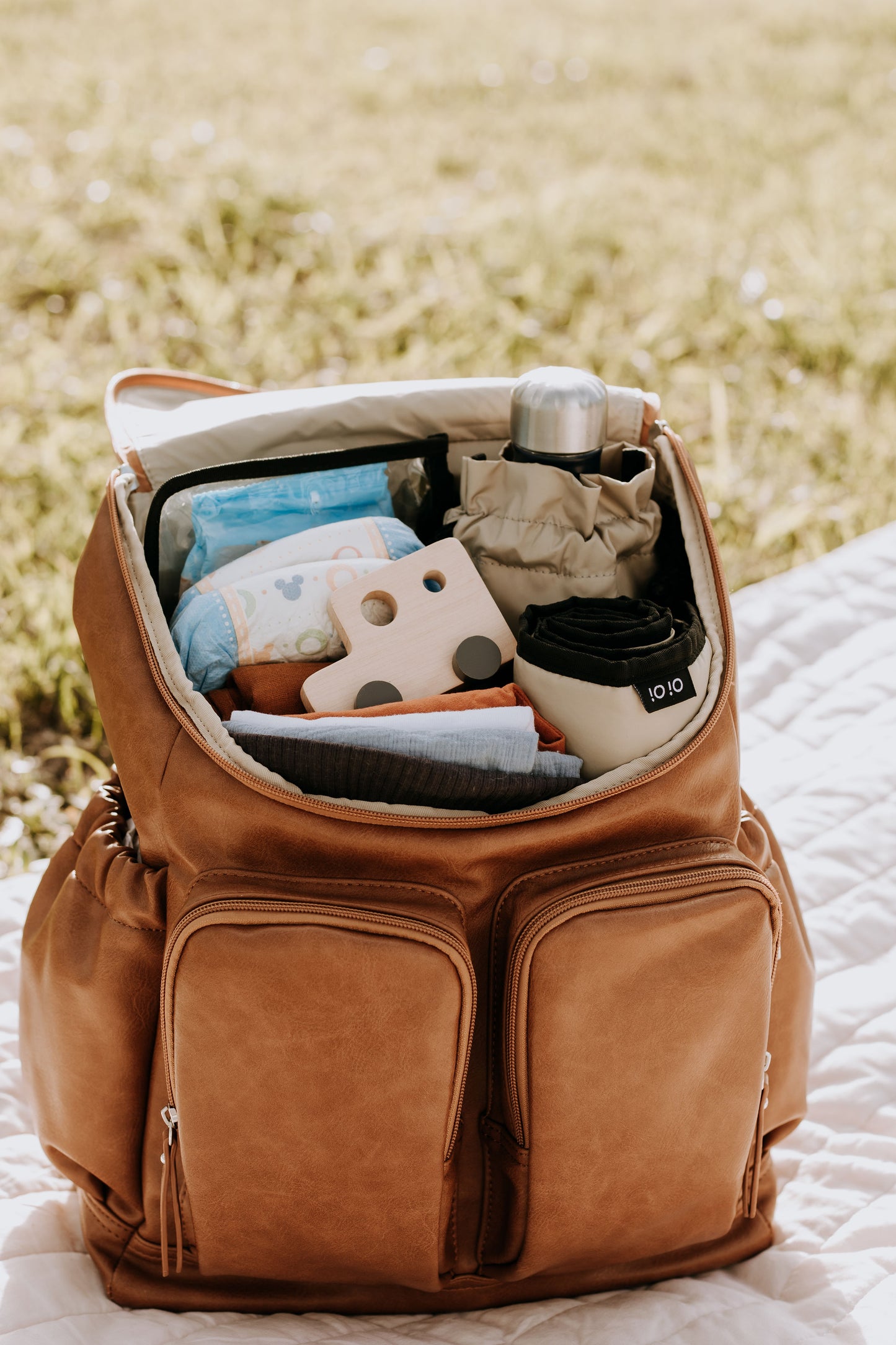 OiOi Faux Leather Nappy Backpack - Tan
