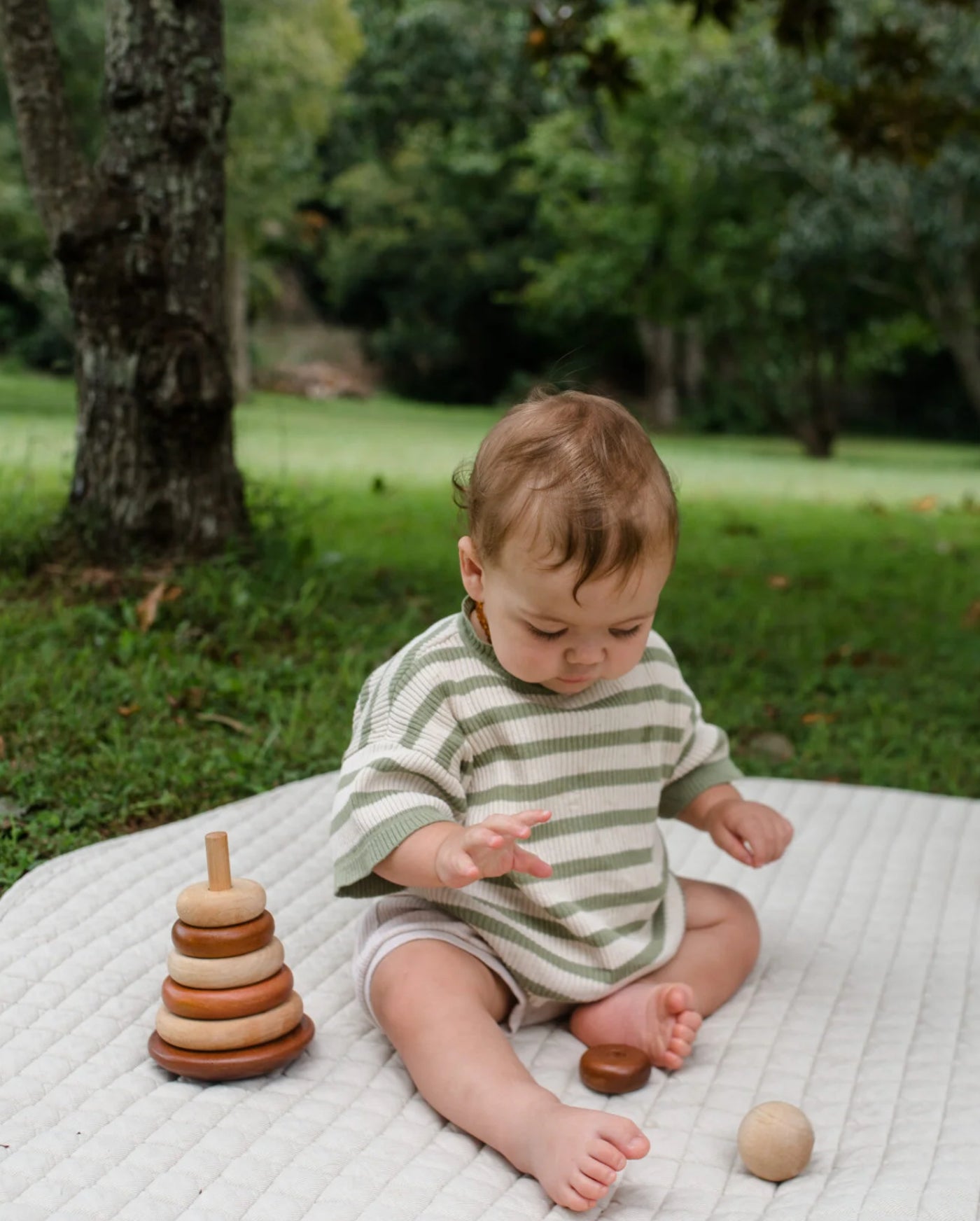 QToys Bouncing Stacking Rings Natural