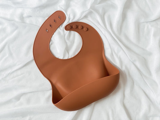 bare. Silicone Bib. Terracotta